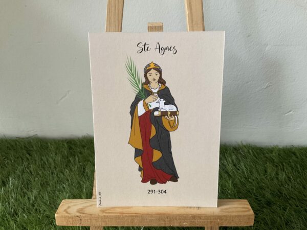 Carte de Sainte Agnès représentée avec sa palme de martyr et un agneau. Imprimée au format A6 sur du papier 300g. 